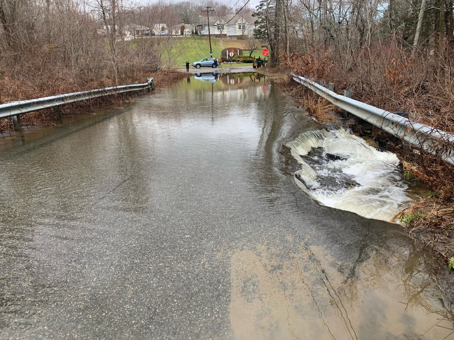 ROADS SUBMERGED: Early Wednesday morning, Jan. 10, Mayor Joseph M. Polisena Jr. took this photo from “Old Pocasset at Briarcliffe.” According to the mayor, “There’s also large-scale residential flooding throughout Johnston.”
